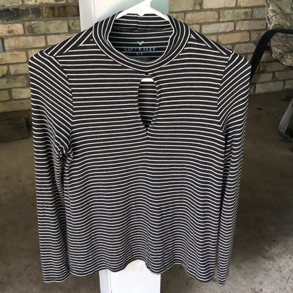Black and white stripped long sleeved shirt.